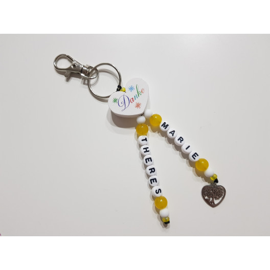 Schlüsselanhänger personalisiert mit schwarzem Blümchen oder Ästchen und  Reiskorn